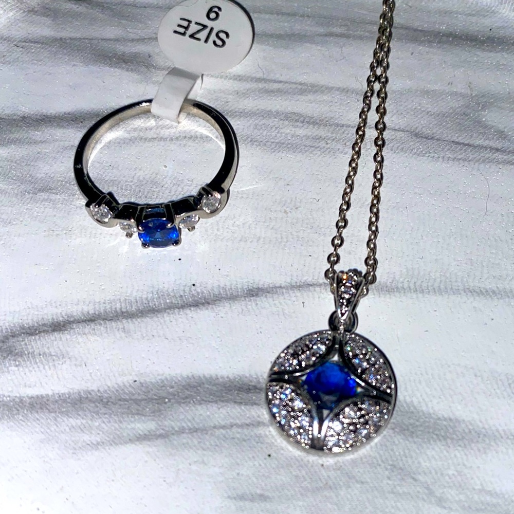 Size 9 ring and matching necklace clear and blue stones